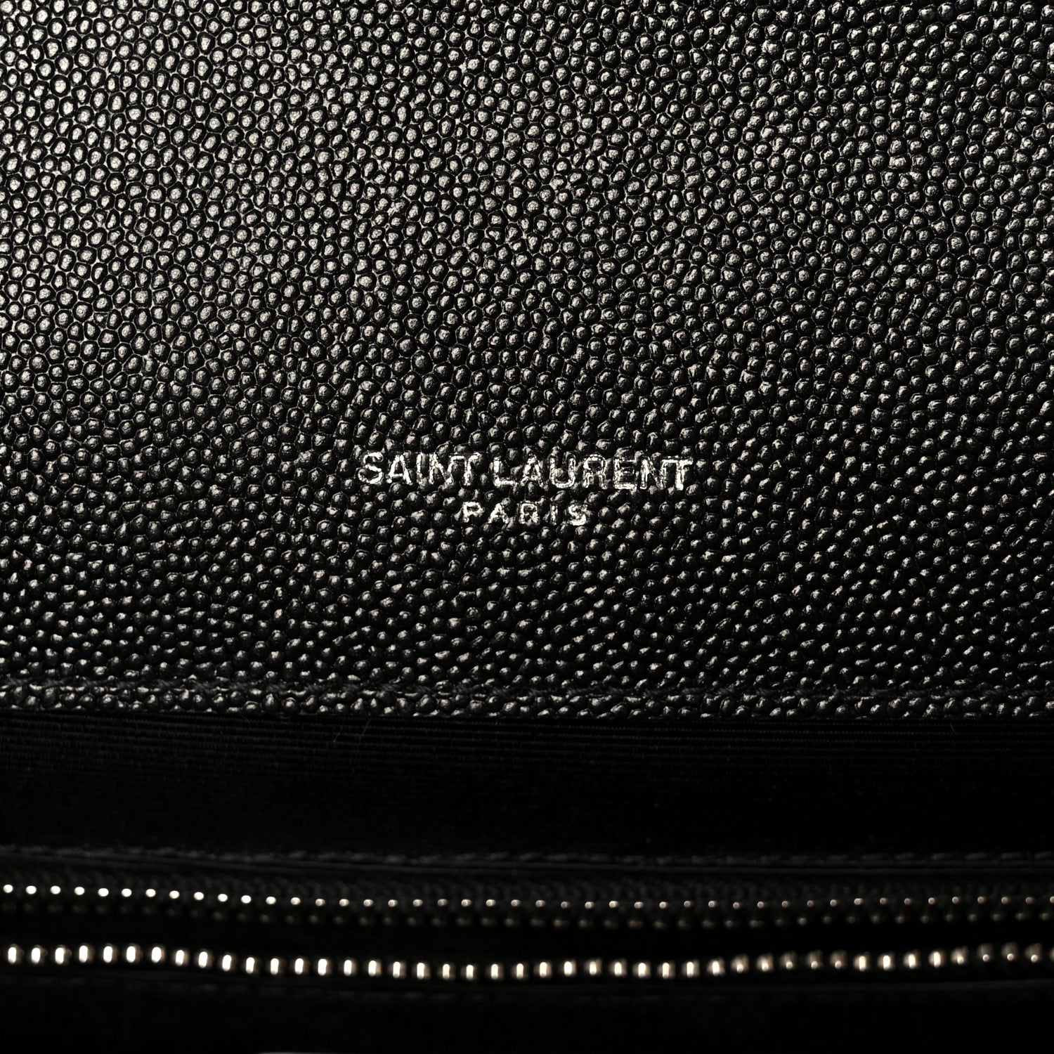 Black grain leather satchel with SAINT LAURENT PARIS embossed on textured surface