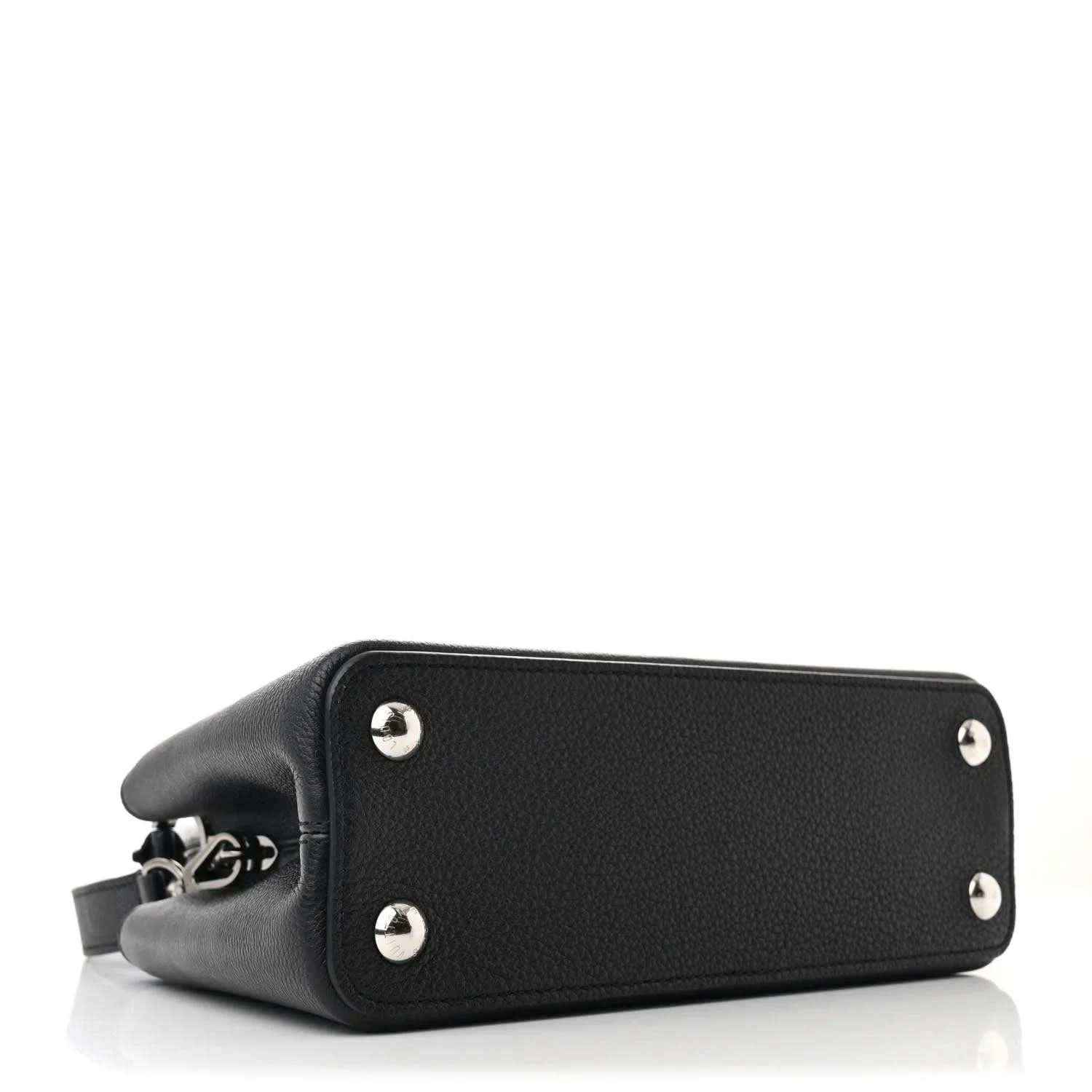 Black leather handbag with silver feet studs and structured bottom panel