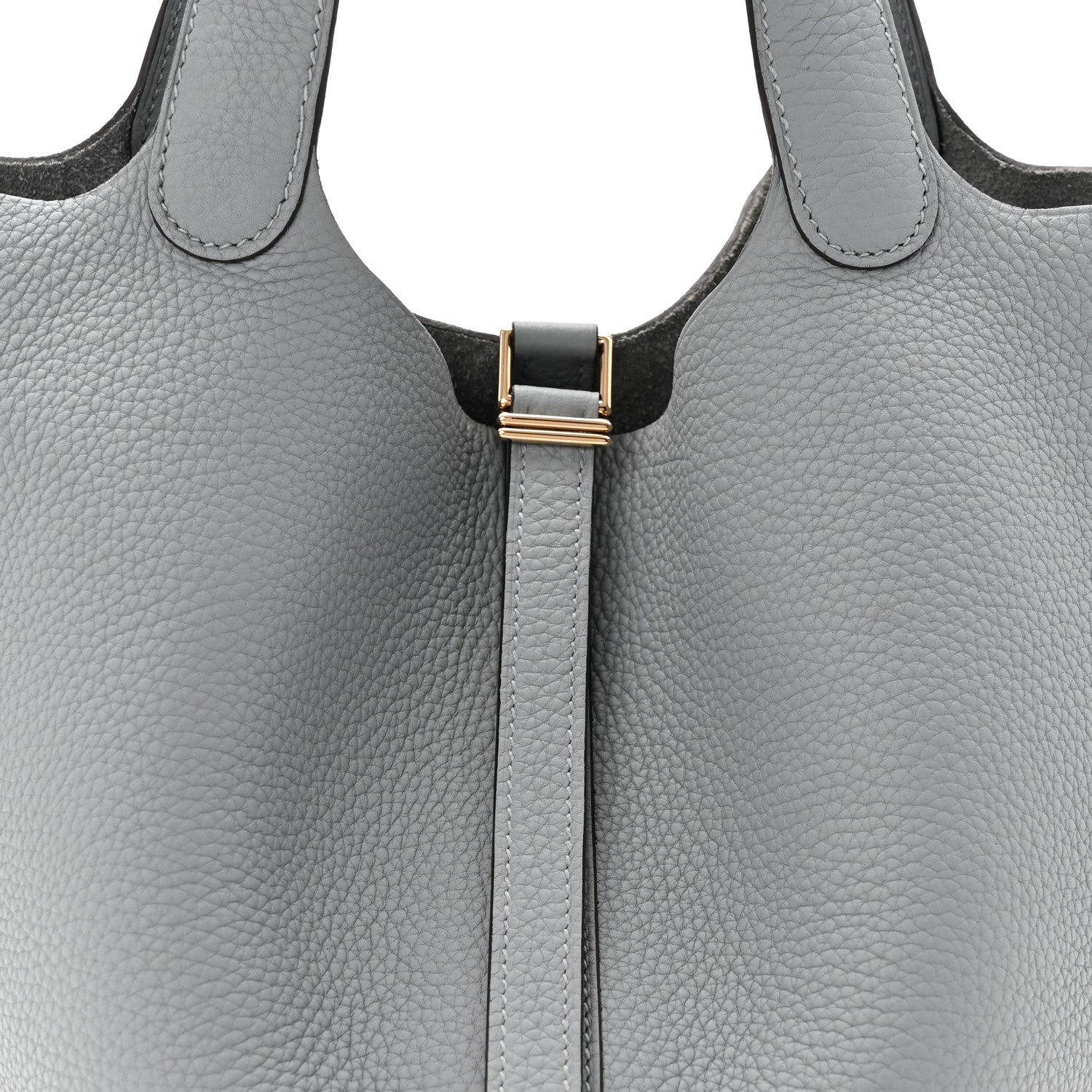 Light gray leather tote bag with top handles and black clasp lock