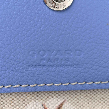 Goyardine tote bag close-up of blue leather texture and stitched edge