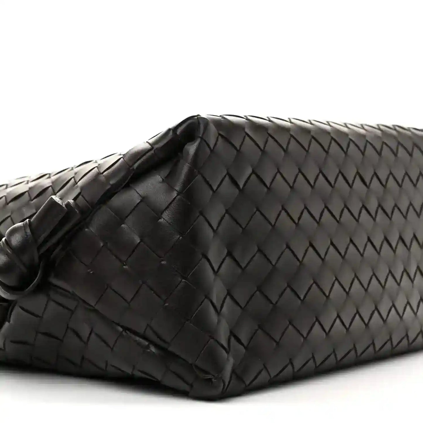 Black woven leather weekender bag end with folded corner and braided texture