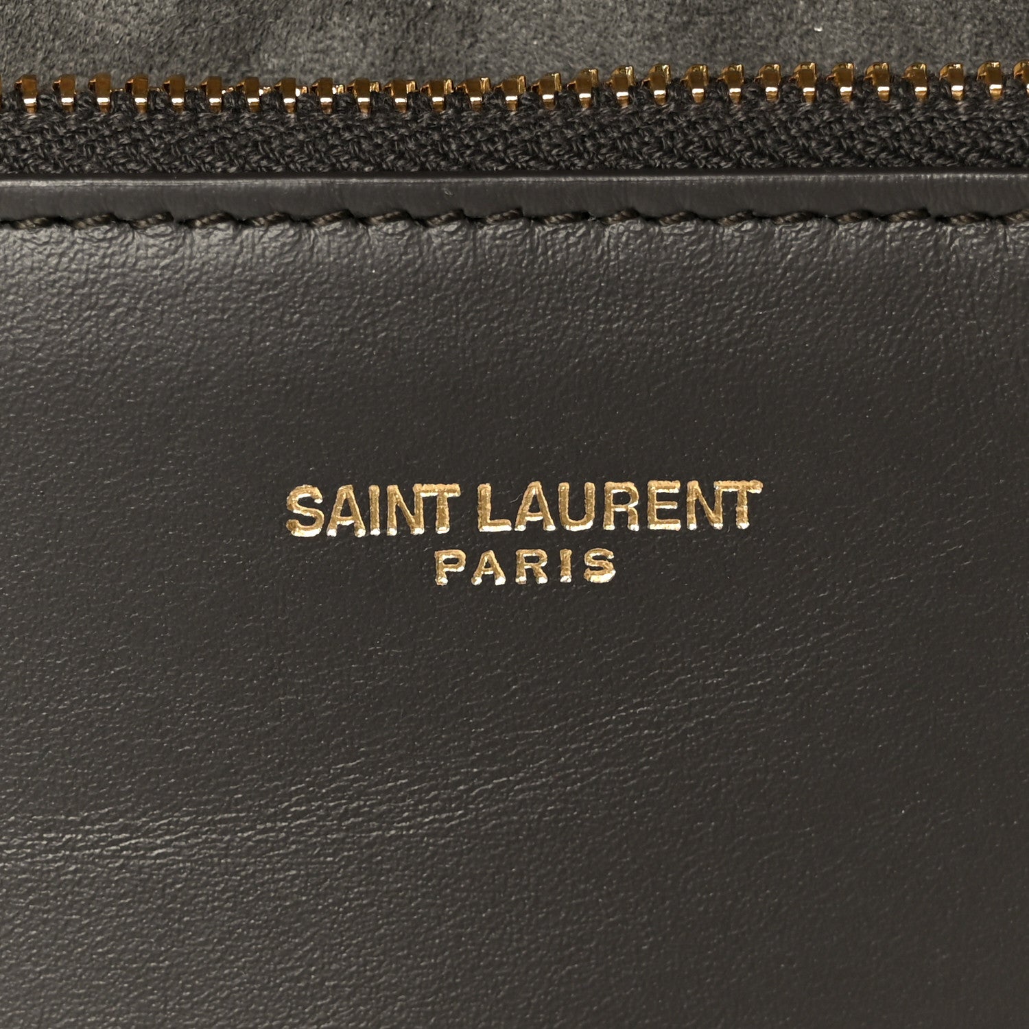 Saint Laurent Paris logo on black leather with gold zipper trim