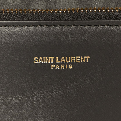 Saint Laurent Paris logo on black leather with gold zipper trim