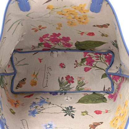 Goyardine tote bag interior, light fabric lining with colorful floral print