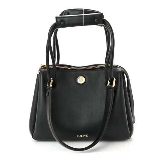 Loewe Small Madrid bag in black leather with top handles, front logo, and zip closure.