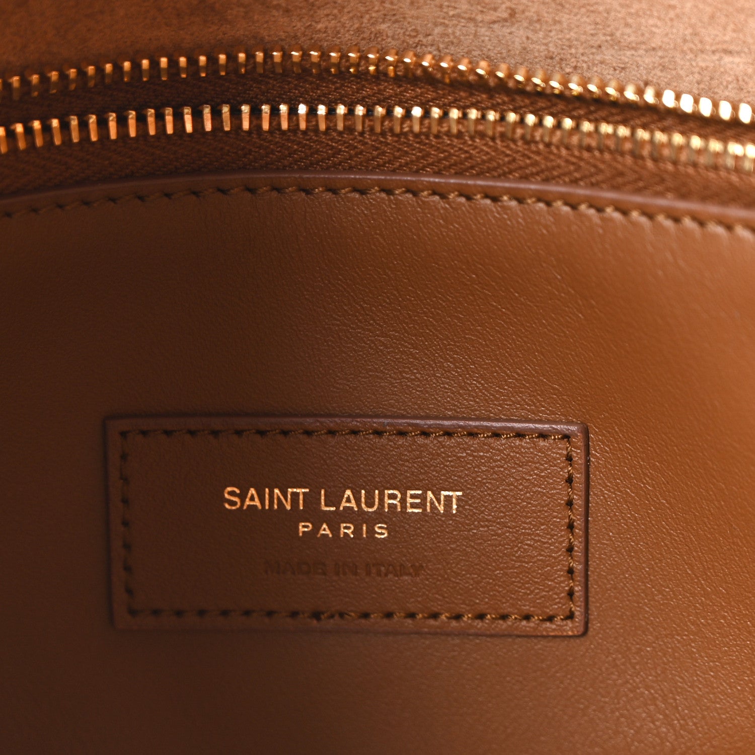 Interior leather brand label reading SAINT LAURENT PARIS near zipper edge