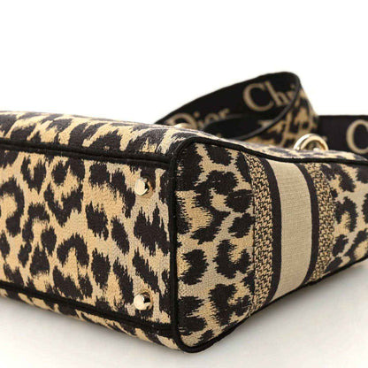 Christian Dior leopard canvas bag side panel with black trim and gold studs