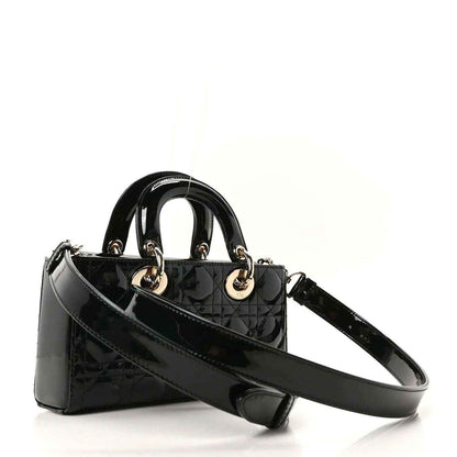 Black patent leather Lady D-Joy bag with shoulder strap and quilted front