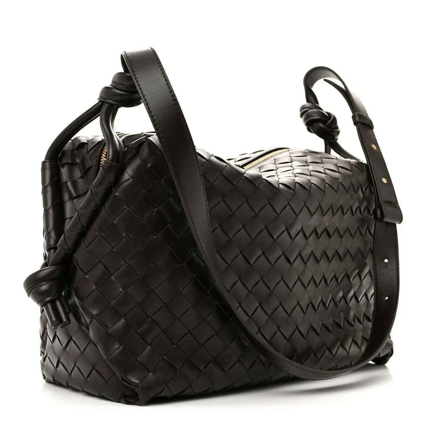 Black woven leather weekender bag with shoulder strap and top loop handle