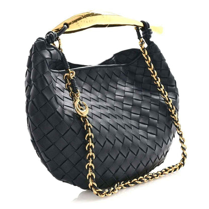 Black intrecciato-style woven leather hobo bag with gold chain strap and ring hardware