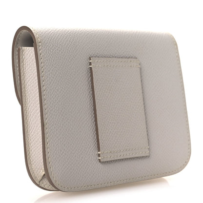 Pale gray leather slim wallet with fold-over flap and stitched front pocket