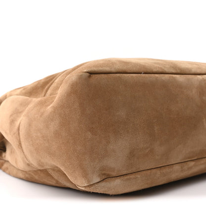 Suede medium tote bag with slouchy rounded base, side close-up