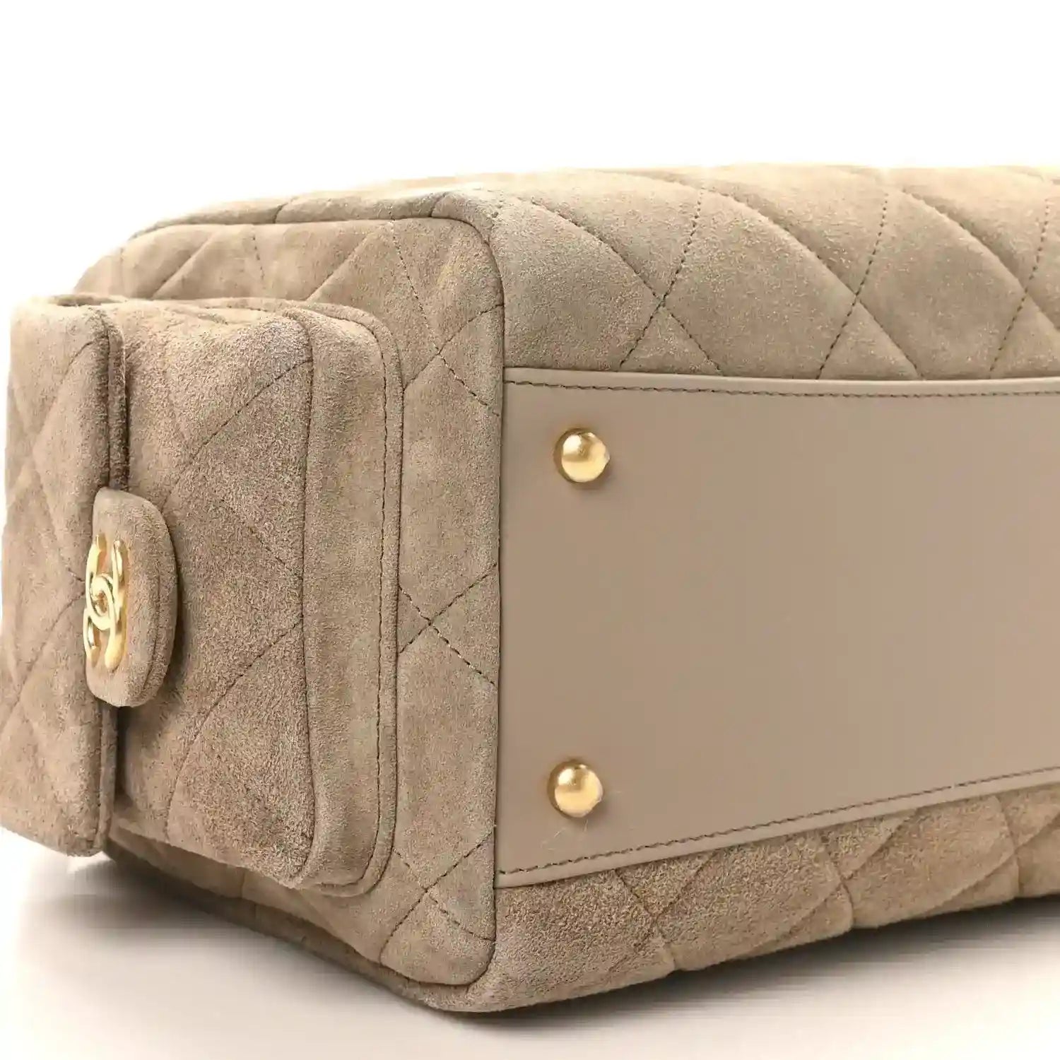 Chanel dark grey quilted suede bowling bag side with gold snap hardware