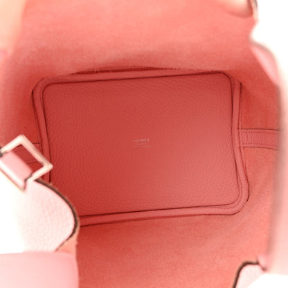 Rose pink handbag interior with stitched lining and small embossed mark