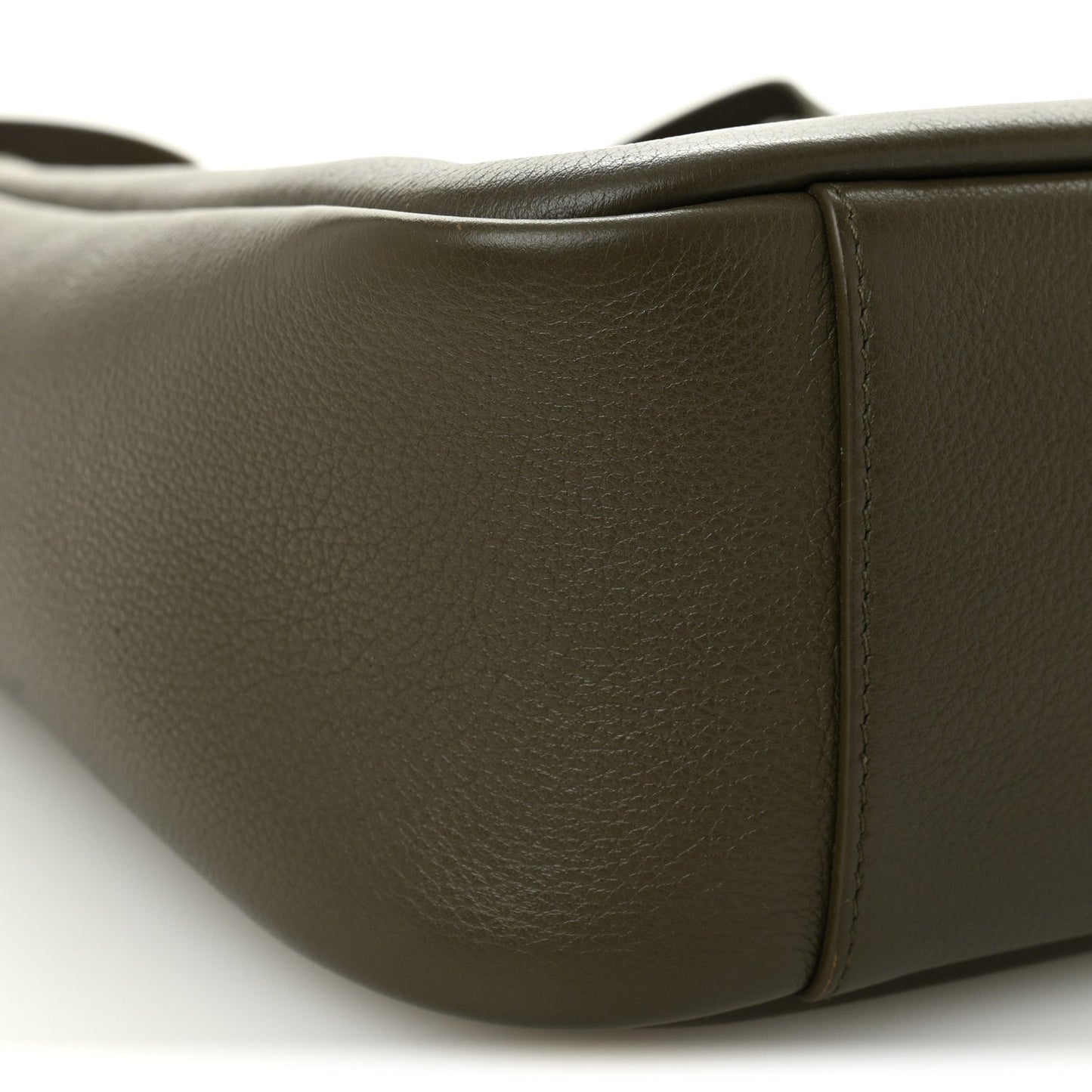 Calfskin hobo bag side panel detail with smooth grain texture and seams.