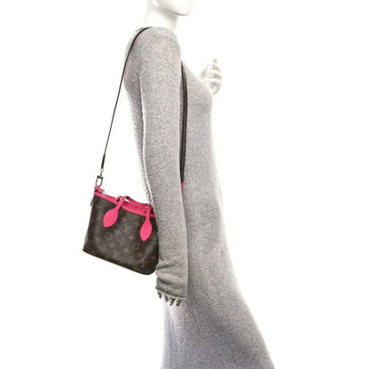Louis Vuitton monogram tote bag with pink crossbody strap and small attached pouch