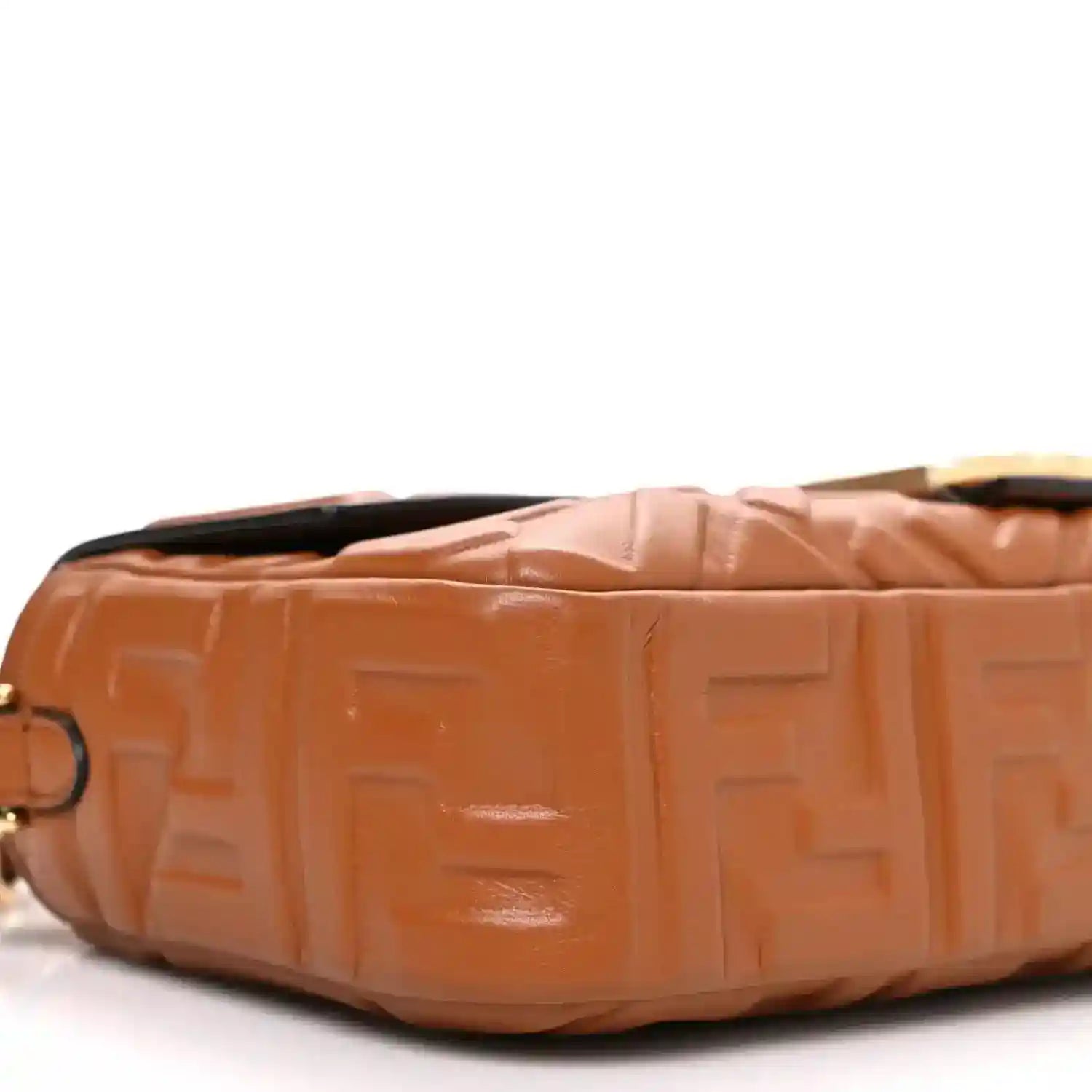 Fendi baguette bag close-up of tan embossed side with glossy finish
