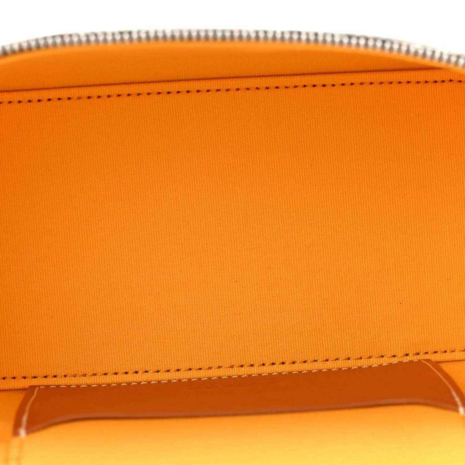 Leather trim panel with stitched edge on mini vanity case