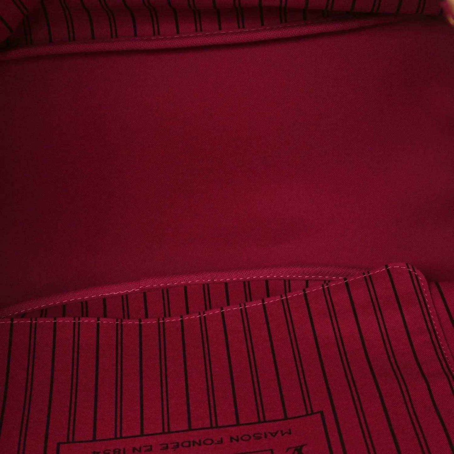 Tote bag interior lining in deep burgundy with stitched edge seam