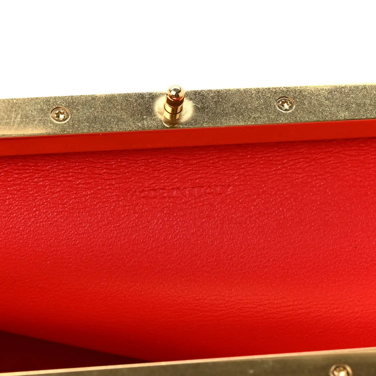 Black leather rectangle bag clasp and gold-tone hardware detail