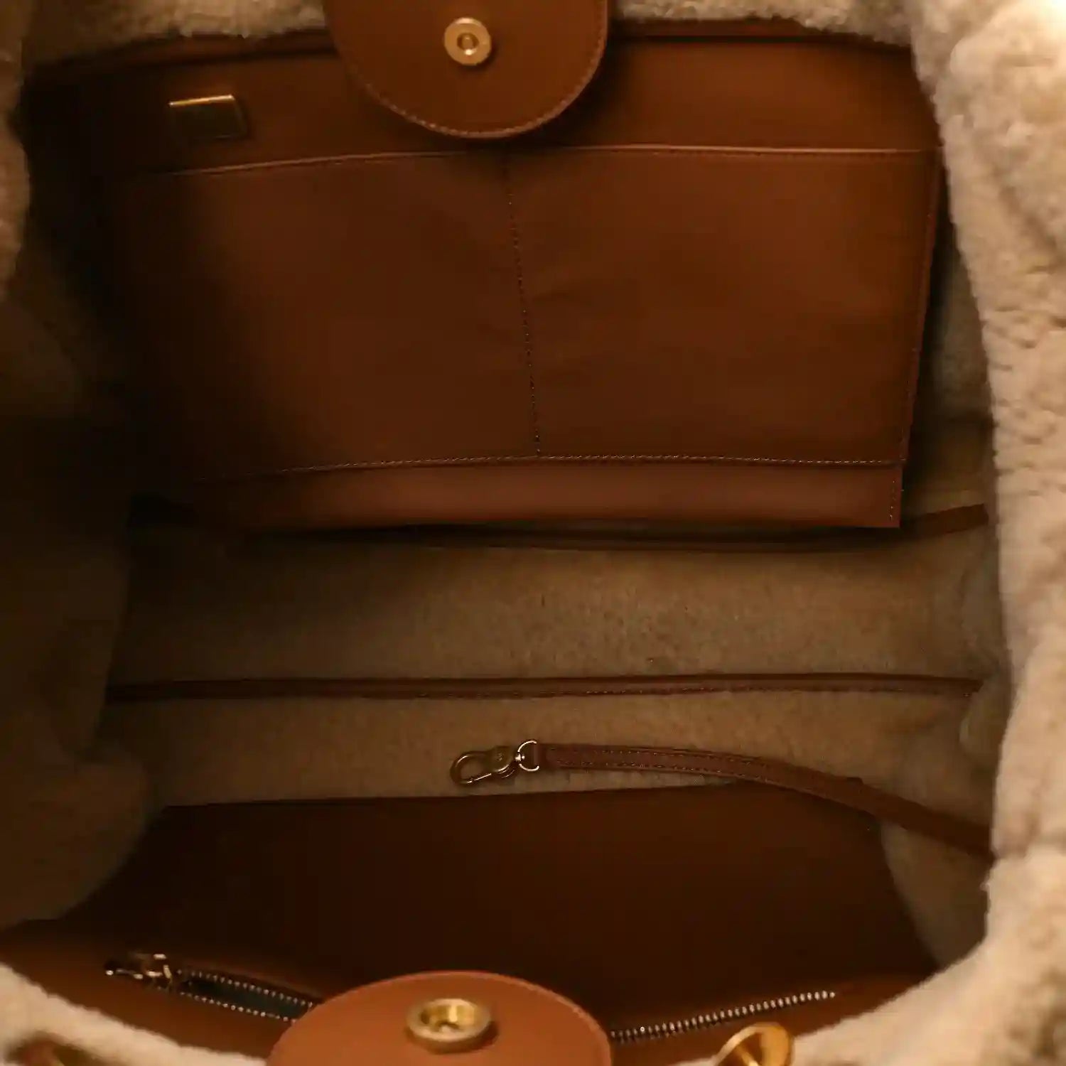 Chanel tote bag interior with leather pocket and zip opening
