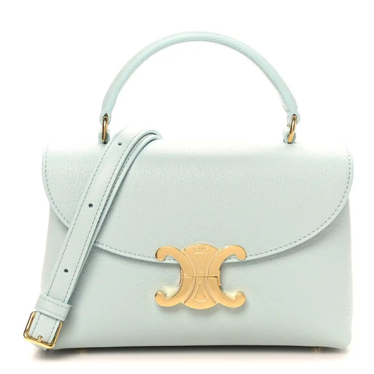 Light blue leather mini top-handle bag with gold logo clasp on front