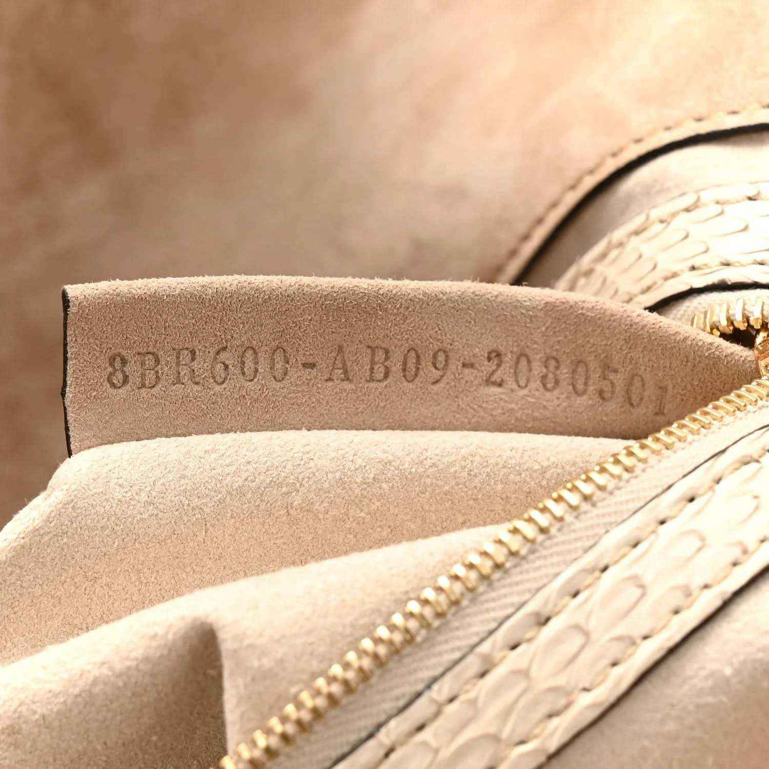Fendi baguette handbag label code stamp on beige suede-like lining