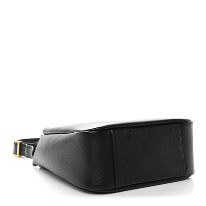 Black calfskin hobo bag with crossbody strap attachment and gold-tone buckle.