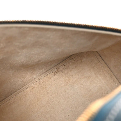 Petrolio teal leather bag interior closeup showing suede-like lining