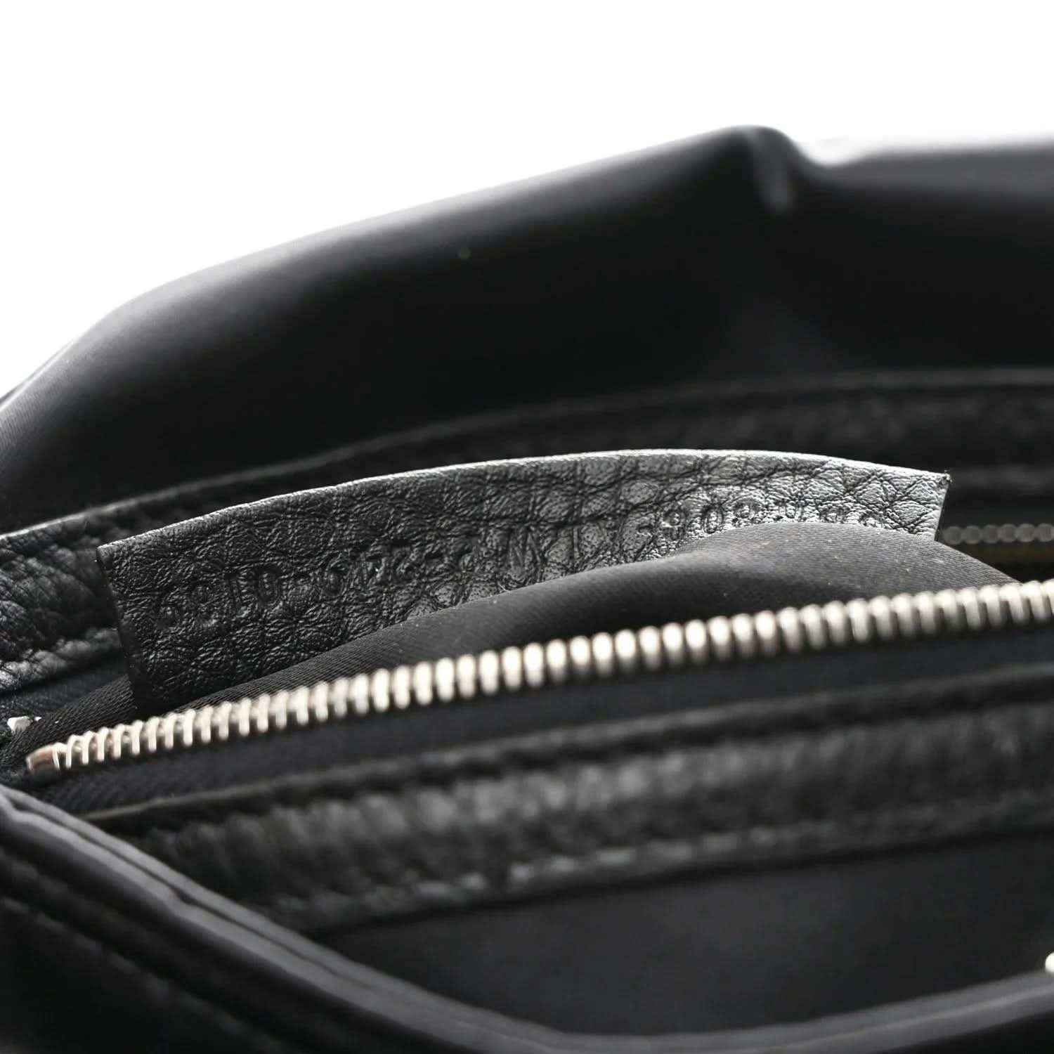 Fendi Econyl black nylon bag showing top zipper and textured inner lining