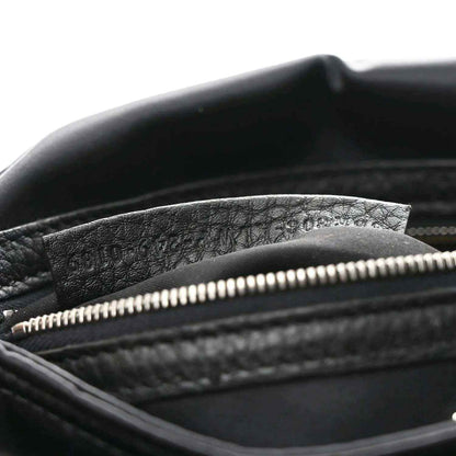 Fendi Econyl black nylon bag showing top zipper and textured inner lining