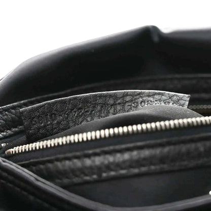 Fendi Econyl black nylon bag showing top zipper and textured inner lining