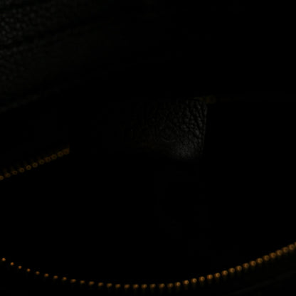 Black interior with gold-trim zipper opening