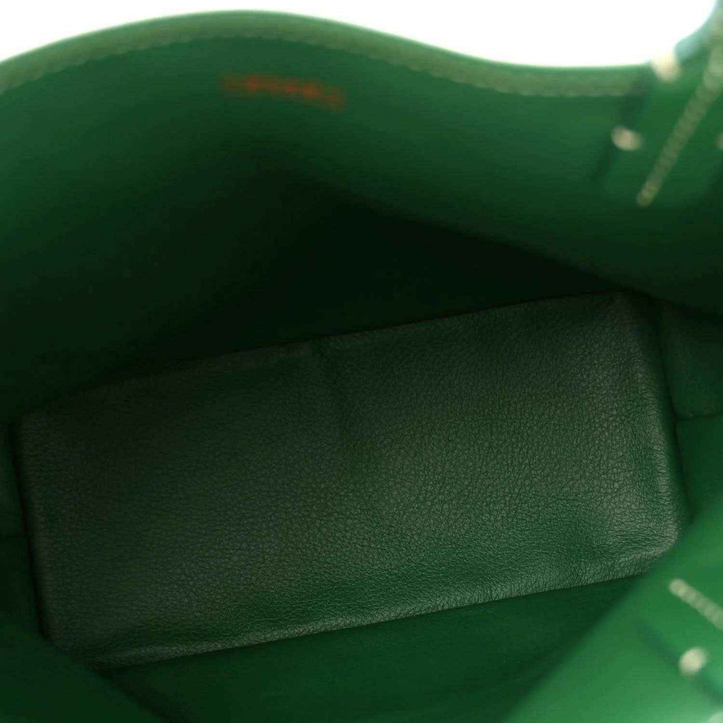 Green reversible mini tote bag interior with fabric lining and visible seams