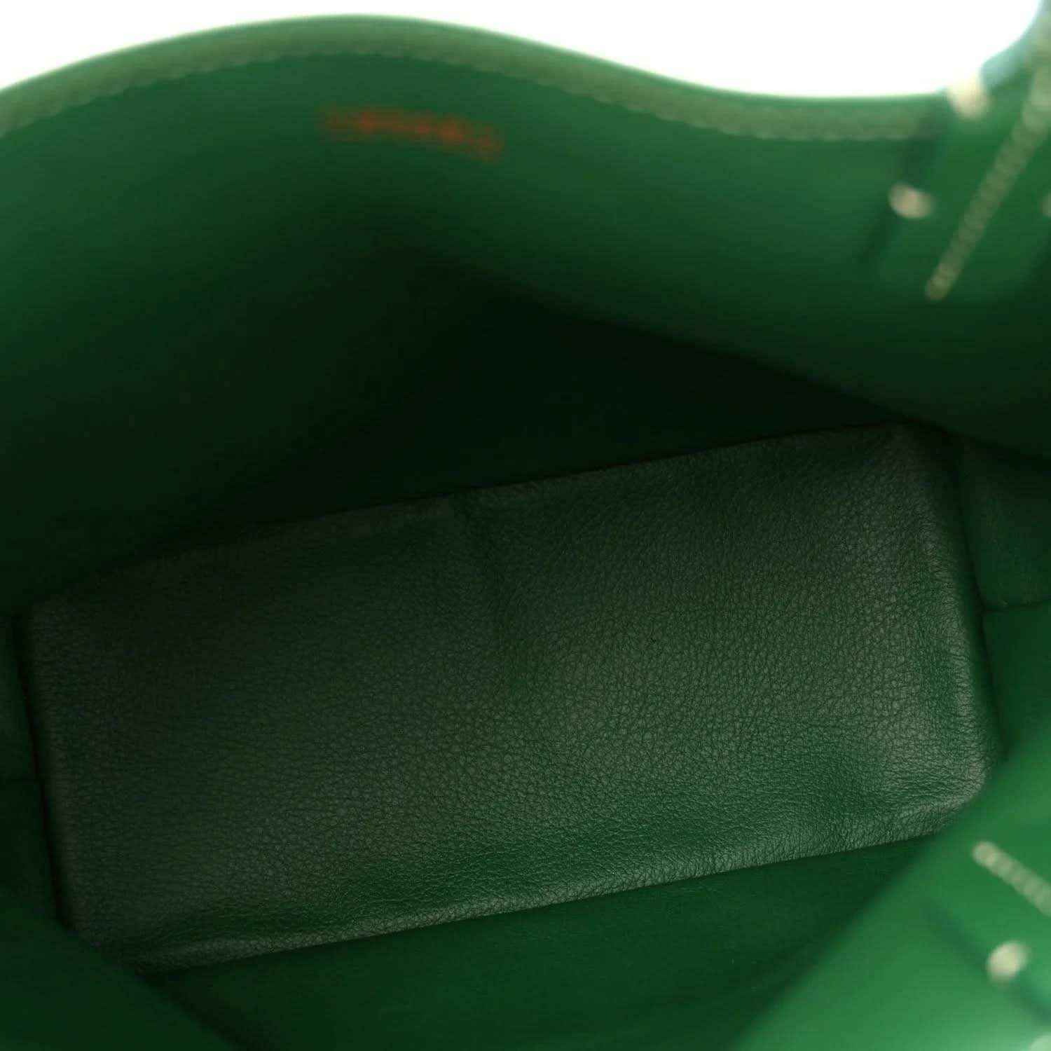 Green reversible mini tote bag interior with fabric lining and visible seams