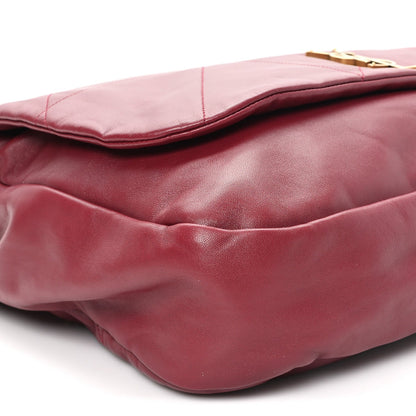 Dark bordeaux lambskin shoulder bag corner with quilted stitching and flap edge