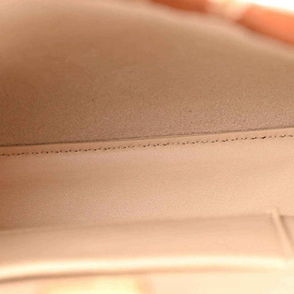Mini Peekaboo satchel interior lining and stitched seam in light beige