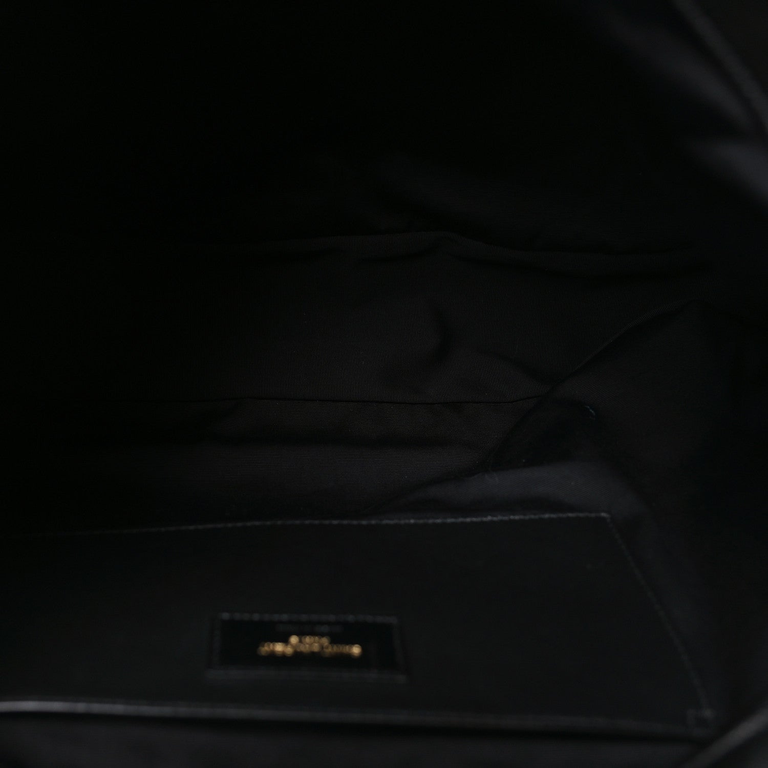 Saint Laurent black lambskin interior lining with zipper opening and small logo tag