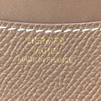 Hermes Paris stamped on etoupe textured leather, Made in France