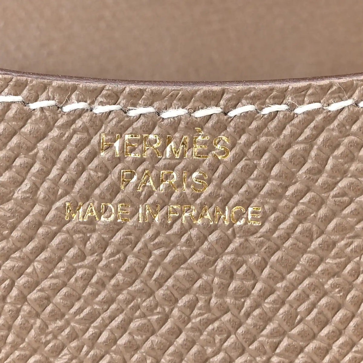 Hermes Paris stamped on etoupe textured leather, Made in France