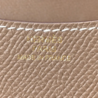 Hermes Paris stamped on etoupe textured leather, Made in France