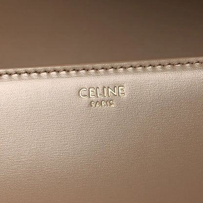 Celine Paris embossed on beige leather with visible edge stitching