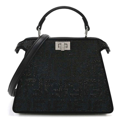 Black crystal satchel with top handles and gold-tone front clasp