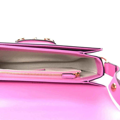Gucci pink leather shoulder bag interior with zip pocket and stitched lining