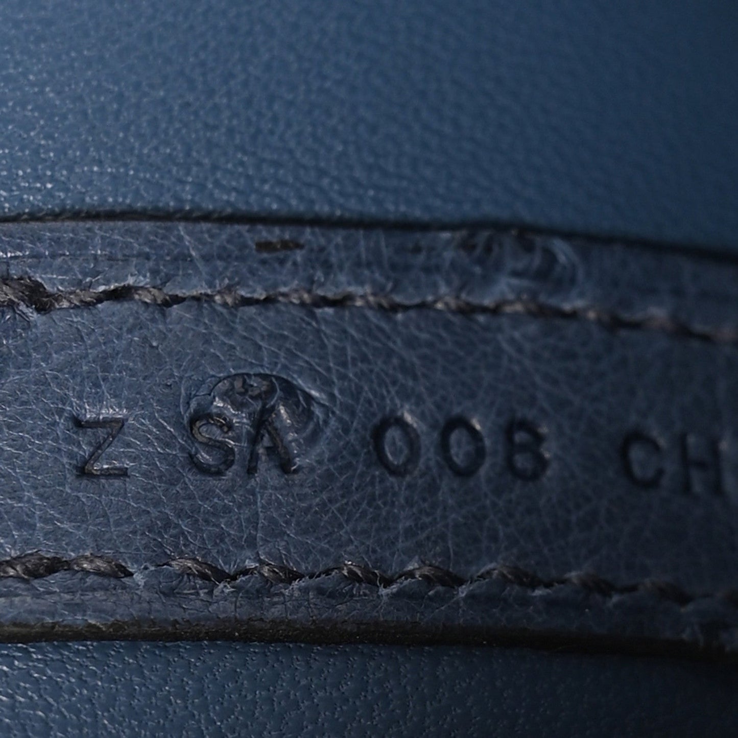Blue leather interior stamp marking: Z SH A 008 CH.