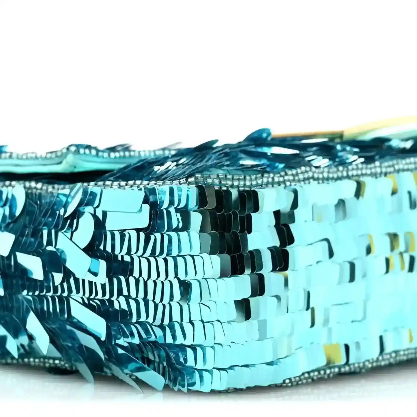 Turquoise sequin baguette bag close-up showing layered sequin texture