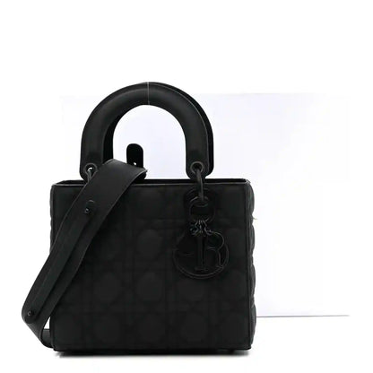 Small Dior Lady Dior bag in black with top handles and shoulder strap