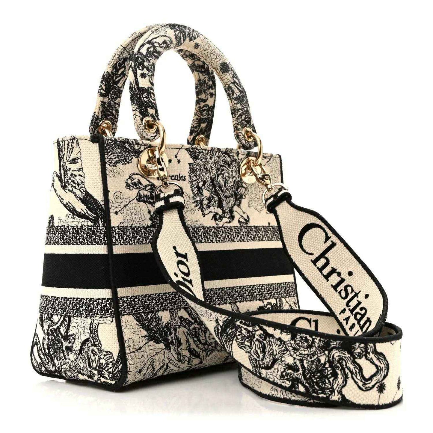 Medium tote handbag with crossbody strap, zodiac toile print, and gold-toned rings.