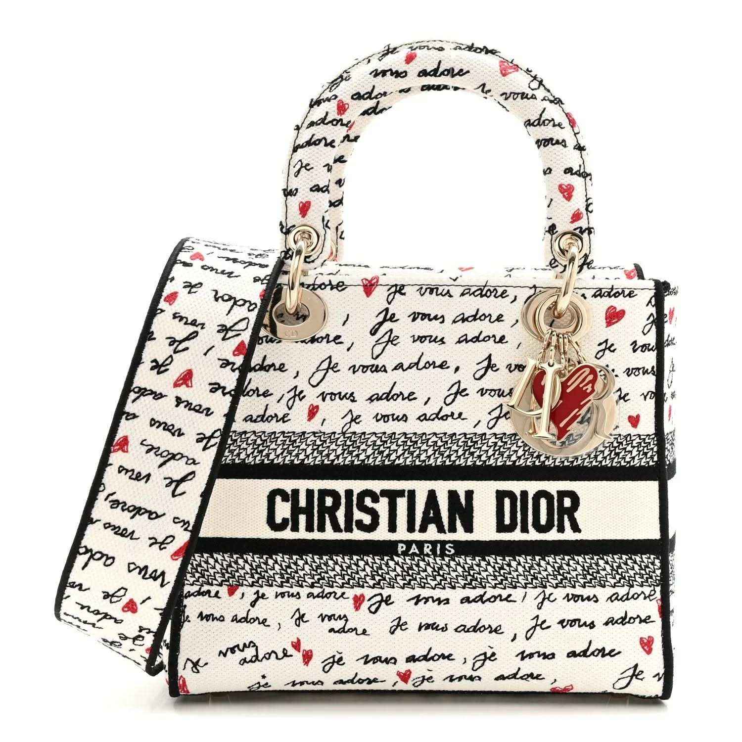 Christian Dior canvas handbag with “Je vous adore” print, red hearts, top handles