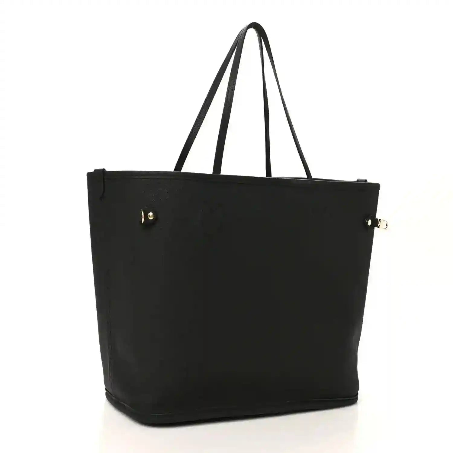 Black tote bag with gold-tone hardware on corners and top handles
